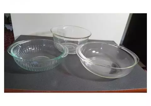 Clear glass bowls, glasses, mixing bowls and coffee mugs
